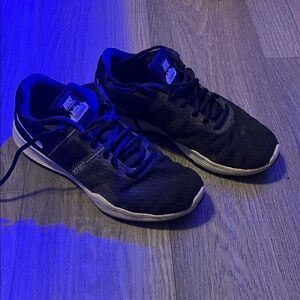 Nike women’s Black and White Athletic Running Sneakers. Size 9